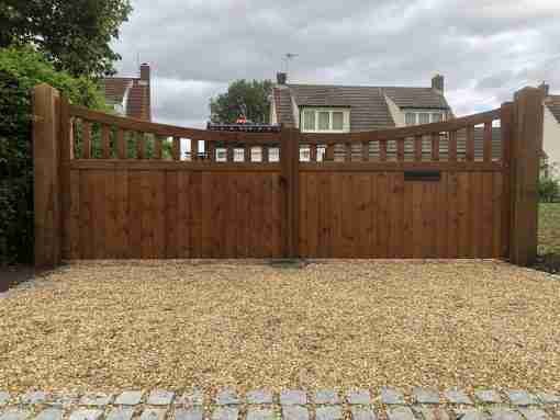 slatted bow top driveway gates - tarmec and croft fencign and gates 01787 224848