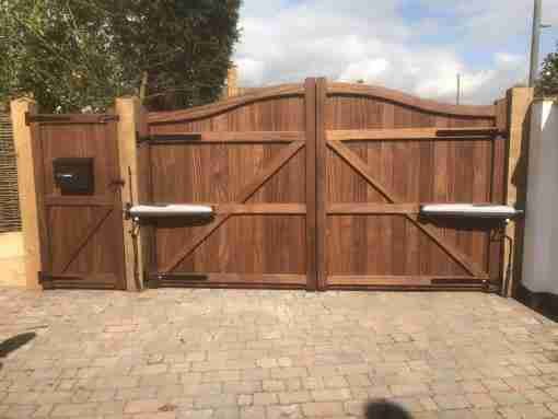 Hardwood Entrance Gates with matching pedestrian gate Suffolk Tarmec and Croft fencing and Gates Ltd