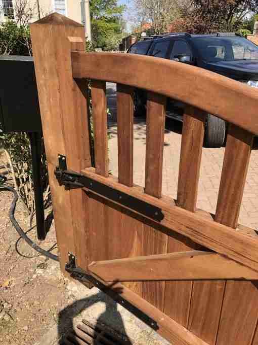 adjustable hook and band nblack on light brown treated gates - tarmec anf croft fencing and gates ltd 01787 224848