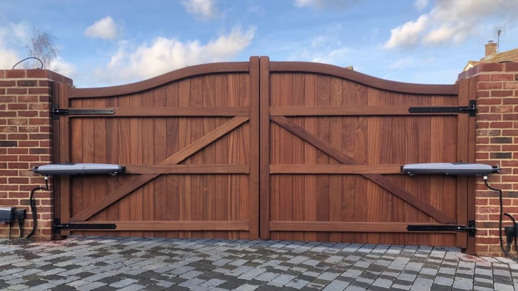 Bow Top Essex electric gates in hardwod