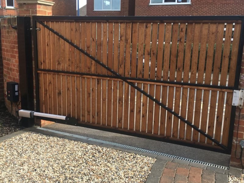 Metal framed driveway gates with automation